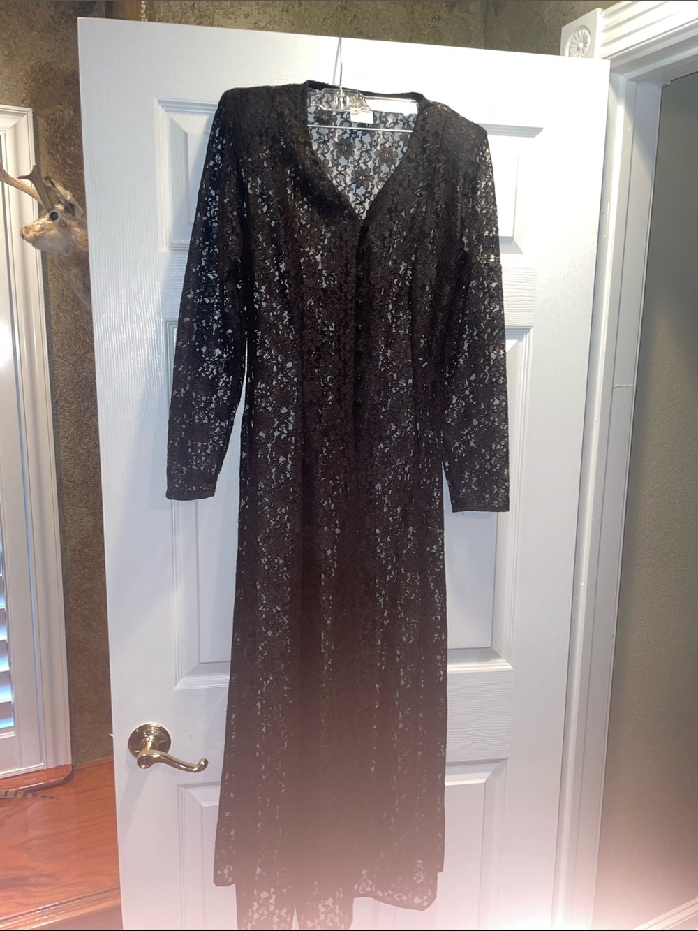 All that Jazz Black Lace Long Sleeve Maxi Dress.  Classy piece.  A lot of detail
